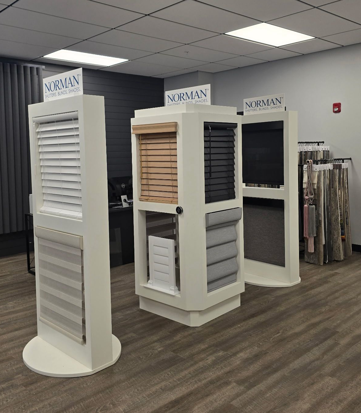 Norman window treatment displays in the Creative Blinds & Drapes showroom in Aurora, IL